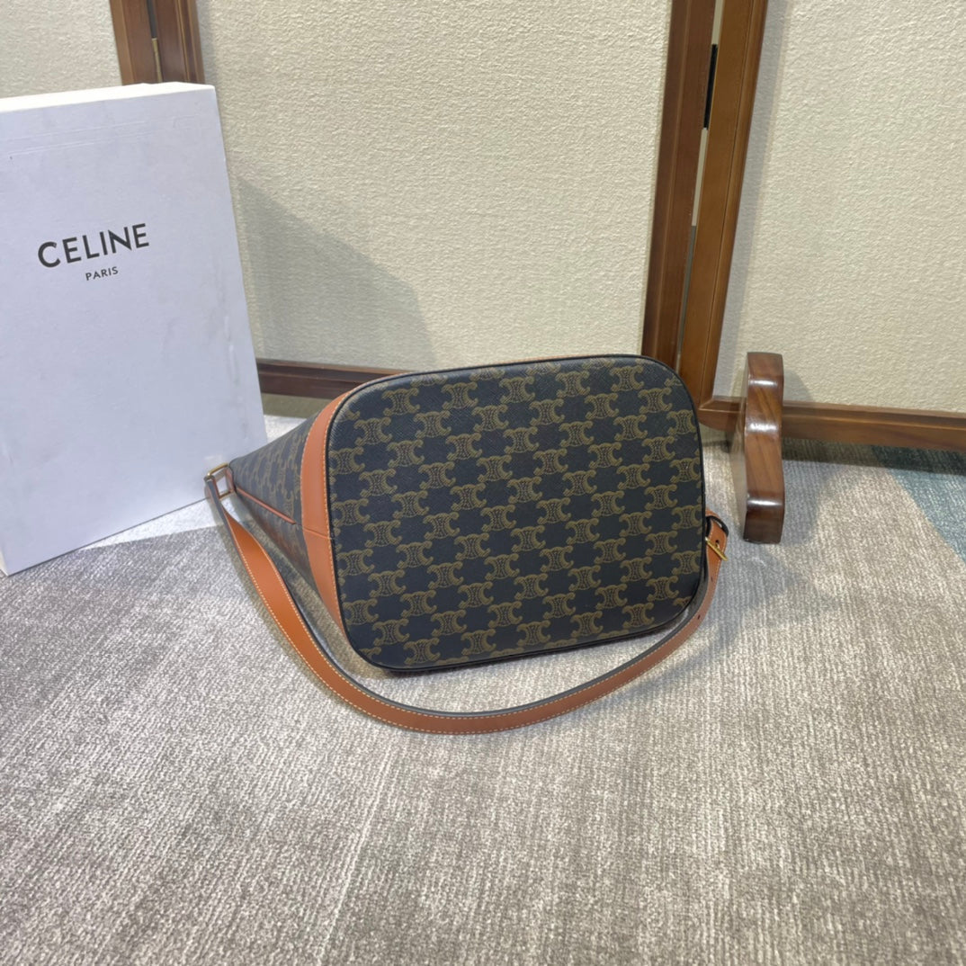 CELINE BUCKET 33 IN BLACK TRIOMPHE CANVAS AND BRONZE BROWN CALFSKIN TRIM