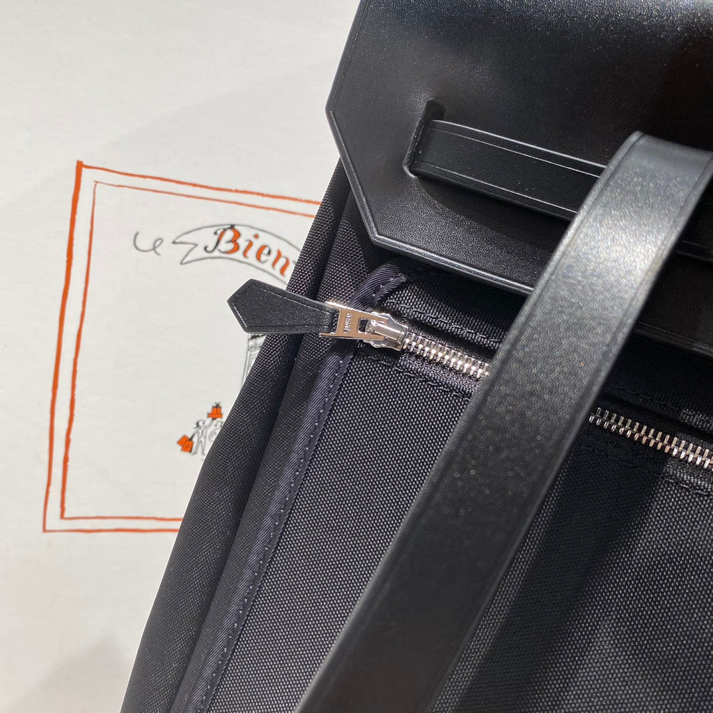 HERMES HERBAG A DOS ZIP RETOURNE BACKPACK 29 IN BLACK CANVAS AND CALFSKIN